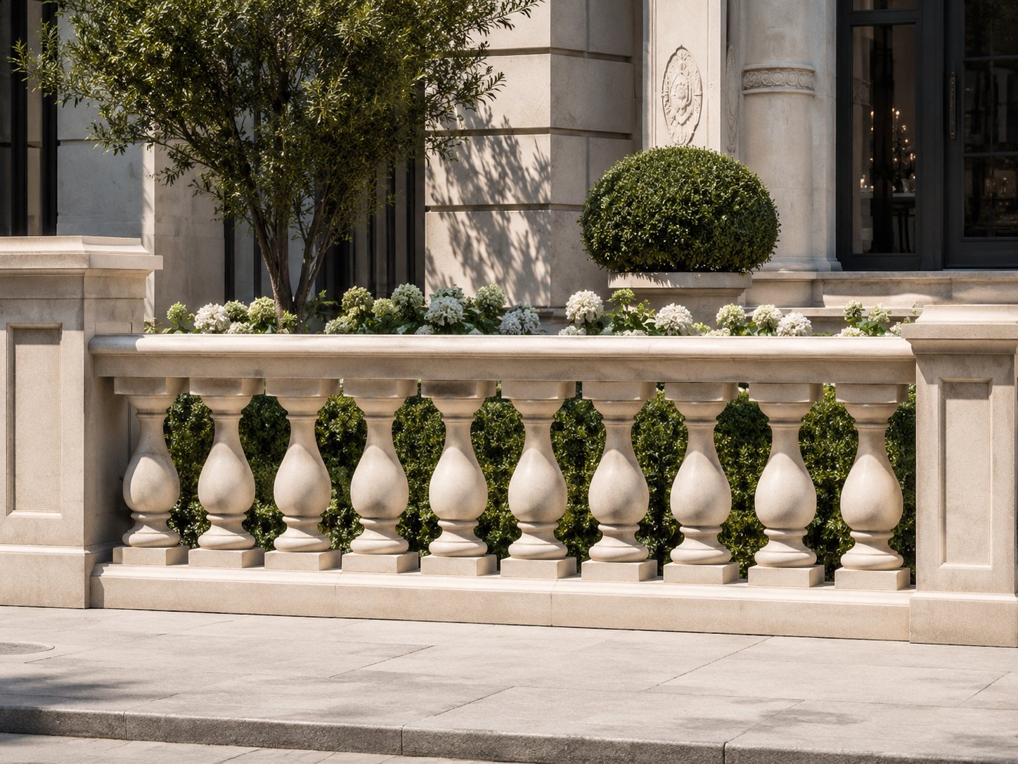 Wide sandstone-style balustrade and exterior stone railing detail